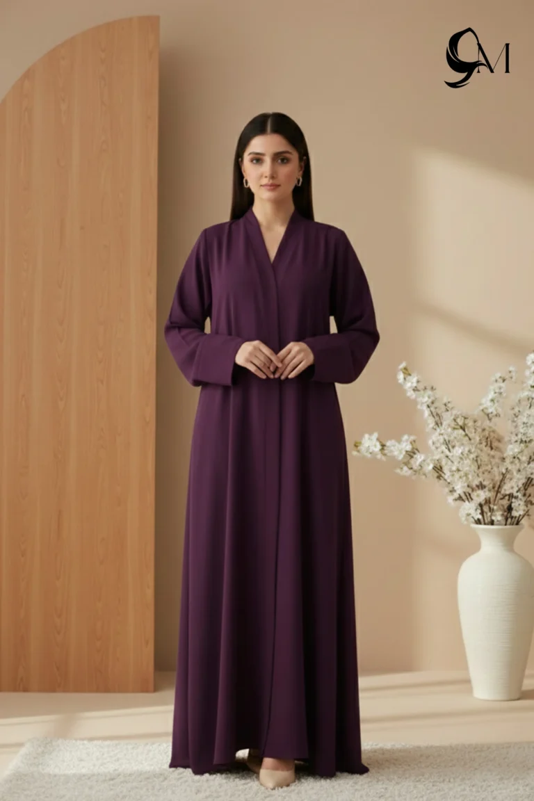Soft Contrast Framing: Pair with a lavender, dusty rose, or cream hijab to brighten the model's face and elegantly highlight the rich purple tones of the garment. Luminous Accents: Use silver or pearl jewelry and nude pointed-toe heels to create a polished, sophisticated finish that balances the depth of the eggplant shade.